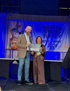 Digital States Survey Award presenation with Jerry Whisman and Teri Takai on statge.